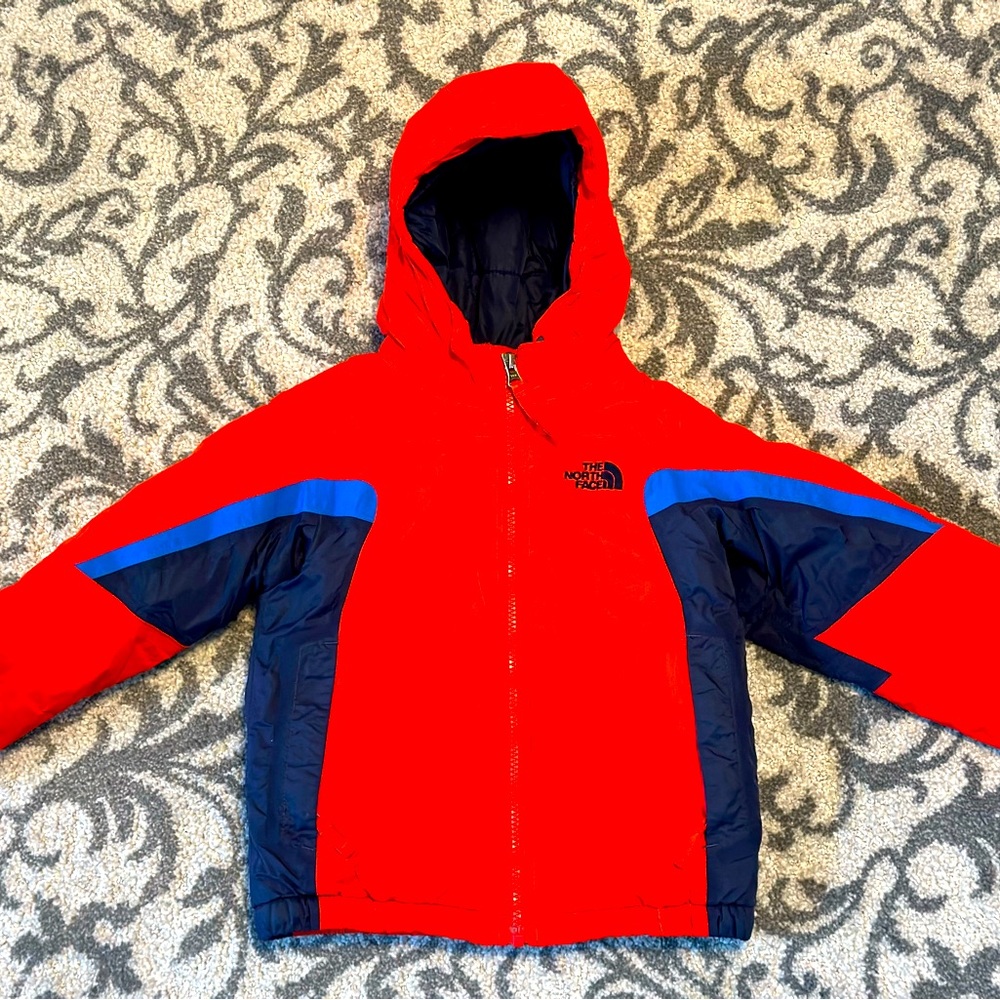 Toddler North Face Winter Coat in excellent condition. Red, navy and royal blue.